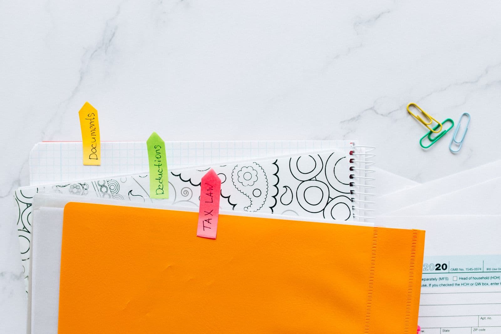 Neatly organized, labeled file folders arranged by category